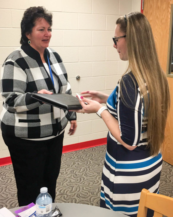Emily Ray, right, a student at Belfry High School (Pike County), talks with Betty Montgomery, the business and marketing program consultant at the Kentucky Department of Education, during her interview. Five students from Pike County schools are working as apprentices in offices of the Kentucky Department for Community Based Services in their home county, and the pilot program has placed students in DCBS offices in five counties. Photo submitted