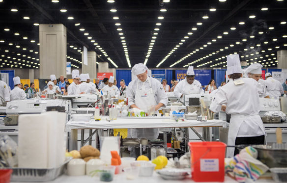 High school culinary students compete in the culinary arts final competition at SkillsUSA. Photo by Bobby Ellis, June 23, 2018