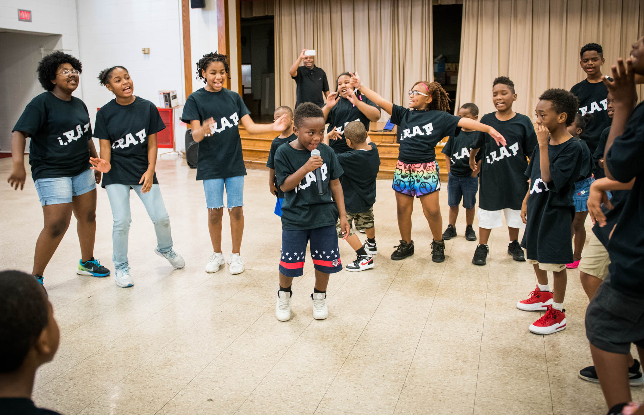 Students take part in a live performance at the closing of the iRap Summer Camp at Wheatley Elementary (Jefferson County). Photo by Bobby Ellis, July 27, 2018