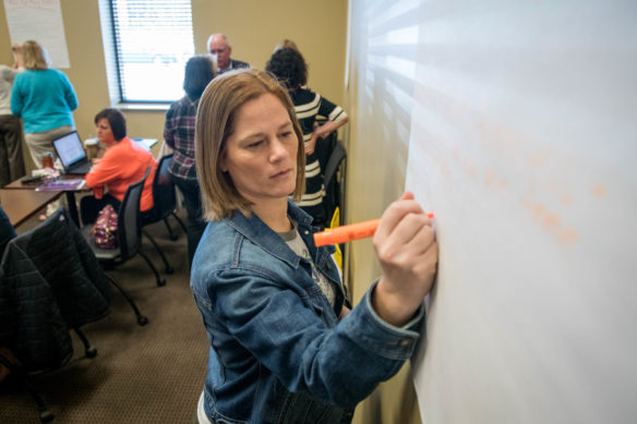 Nicole Clements, a teacher at Webster County High, takes part in a conference about writing new social studies standards. Starting in March, the 31-member Social Studies Standards Advisory Panel and the 13-member Review and Development Committee – both made up of teachers, postsecondary education representatives and members of the business community – began a series of meetings to review and revise the standards. Photo by Bobby Ellis, April 12, 2018