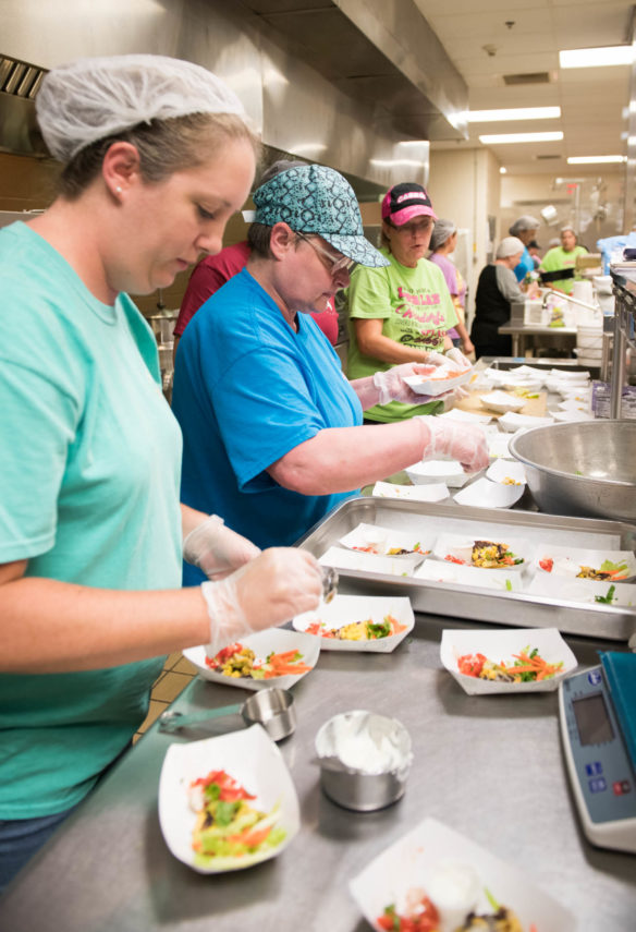 School nutrition professionals make foods with meat alternatives during the nutrition training lab at Henry County Middle School. Photo by Bobby Ellis, Aug. 1, 2018