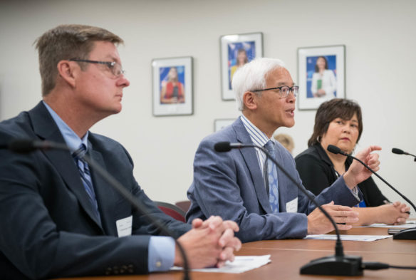 The Center for Assessment's Brian Gong, center, and Chris Domaleski join Associate Commissioner Rhonda Sims for a report on accountability performance standards setting during a special meeting of the Kentucky Board of Education. Photo by Bobby Ellis, 