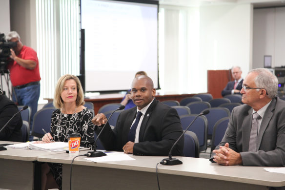 Education Commissioner Wayne Lewis, center, speaks to the Kentucky Board of Education Oct. 3 about the importance of making high school diplomas mean more in the Commonwealth. At the meeting, the board unanimously approved an amendment to Kentucky’s minimum high school graduation requirements. With Lewis are, from left, Associate Commissioners Amanda Ellis and David Horseman. Photo by Megan Gross, Oct. 3, 2018