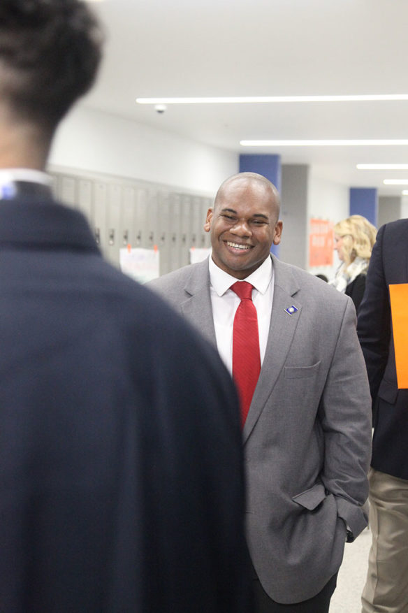 Wayne Lewis talks with a student at Frederick Douglass High School (Fayette County) about the academies offered there during a visit to the school. Lewis, who began his career in education as a special education teacher in his native Louisiana, was named Kentucky’s seventh commissioner of education earlier this year. Photo by Megan Gross, Dec. 3, 2018