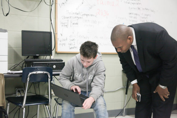 Commissioner Wayne Lewis talks with Bernheim Middle School student Vincent Reiser about what they've been learning in class. Lewis and two members of the Kentucky Board of Education visited Bernheim and four other schools Jan. 29 as a part of his “Conversations with the Commissioner tour.  Photo by Megan Gross, Jan. 29, 2018
