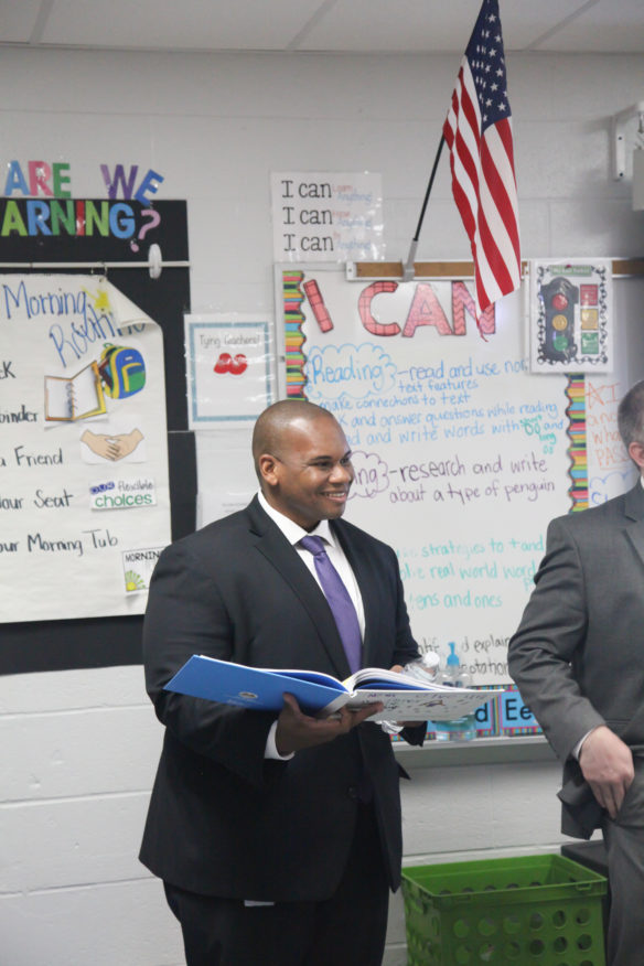 The commissioner reads a story from a book the elementary students had published at Old Kentucky Home Elementary School (Nelson County). Photo by Megan Gross, Jan 29, 2018