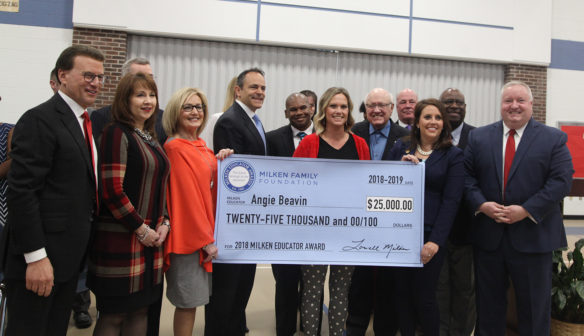 Angie Beavin, center, a 5th-grade teacher at Peaks Mill Elementary School, was named a winner of a Milken Educator Award Feb. 11. The Milken Educator Award, hailed by "Teacher" magazine as the “Oscars of Teaching," comes with an unrestricted $25,000 cash prize. She is the only Milken Educator Award winner from Kentucky this year and is among the 33 honorees nationally. Photo by Megan Gross, Feb. 11, 2019