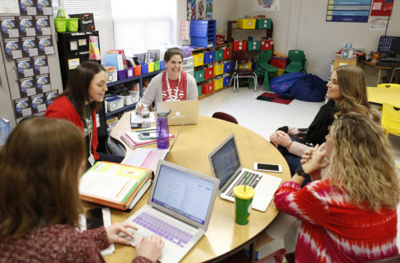 Lisa Brown, a special education teacher at Junction City Elementary School (Boyle County), meets with, left to right, 1st-grade teacher Kristen Lucas, 1st-grade teacher Katharyn Stump, student-teacher Caroline Bristow and 1st-grade teacher Heather Lockhart. Special education teachers regularly collaborate with the teachers with whom they co-teach in shared learning classrooms. Photo by Mike Marsee, Feb. 14, 2019