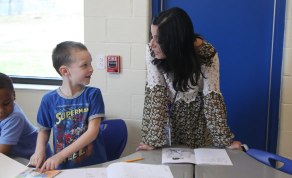 Sarah Estabrook,, the principal at Spottsville Elementary School (Henderson County), talks with student Michael Blair. Photo by Megan Gross, March 20, 2019