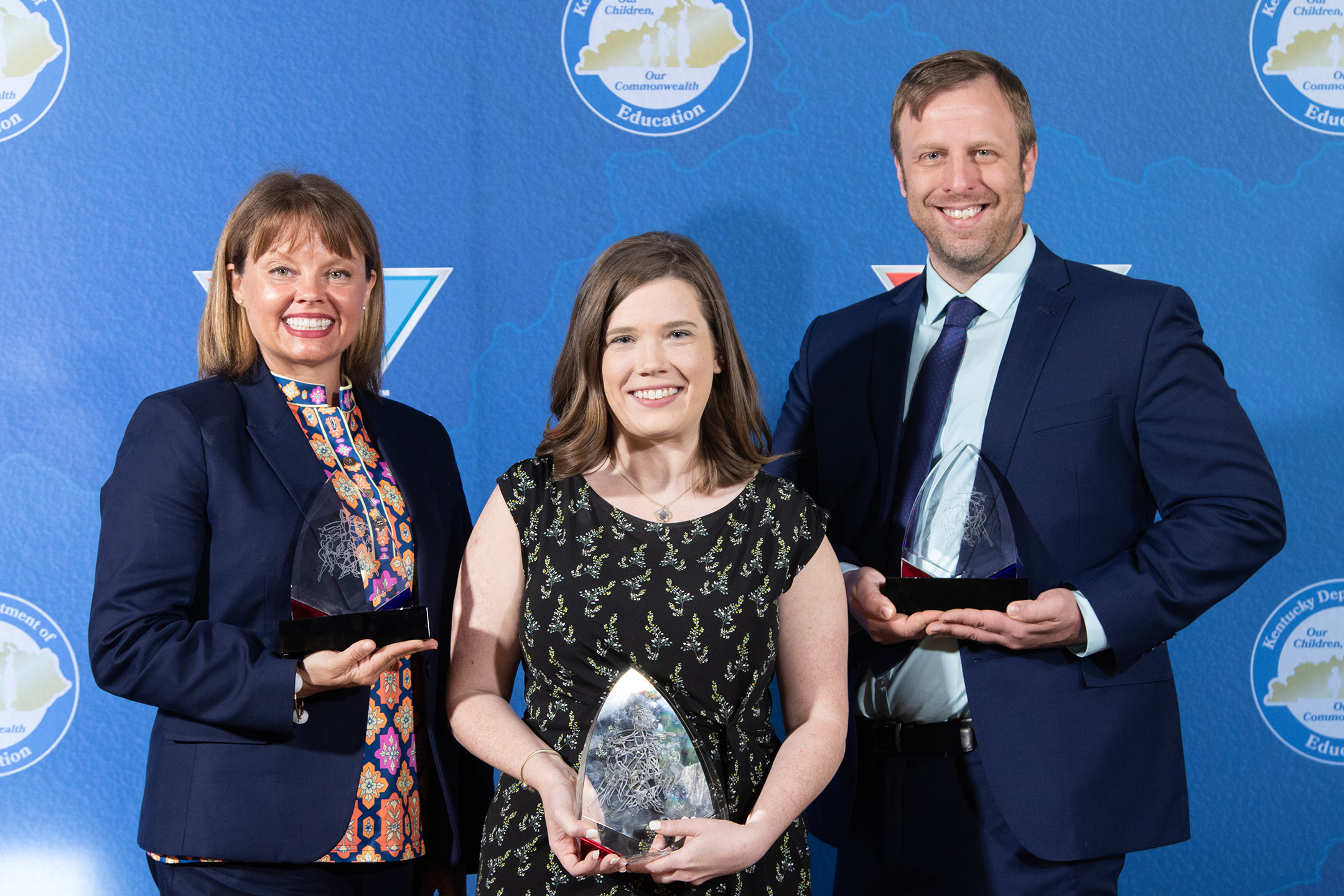 Erin Elizabeth Ball, center, a language arts teacher at Georgetown Middle School (Scott County), was named the 2020 Kentucky Teacher of the Year at a May 20 ceremony in Frankfort.