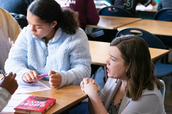 Erin Ball, right, assists Jayda Chenault with an assignment at Georgetown Middle School.