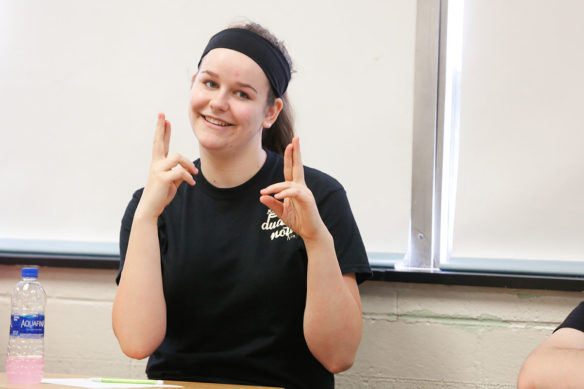 Ysabel Jacobson, a student in an American Sign Language class at West Jessamine High School (Jessamine County), communicates with teacher Samantha Fowler using ASL. Photo by Mike Marsee, May 10, 2019