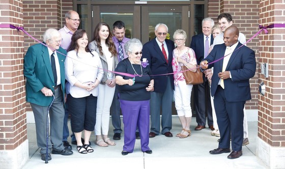 Carolyn Gulley, daughter of the late Margaret D. Marshall, and Kentucky Education Commissioner Wayne Lewis cut the ribbon to open the new Margaret D. Marshall Elementary School.