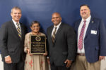 At its meeting June 5, the Kentucky Board of Education presented the Dr. Samuel Robinson Award to Dr. Chandra Varia, second from left, a retired physician from Floyd County.