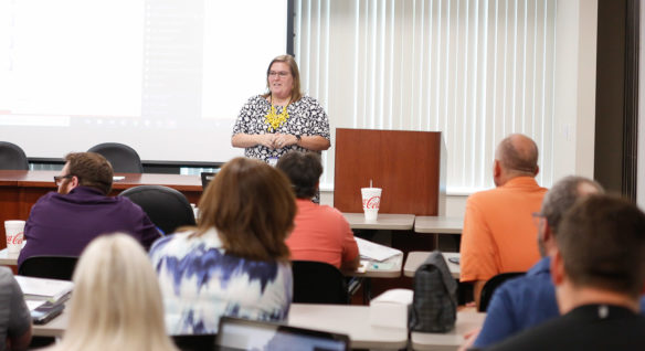Jodi Adams, director of the Kentucky Department of Education’s New Teacher Institute, speaks to a cohort during a training session in Frankfort. Photo by Mike Marsee, June 10, 2019