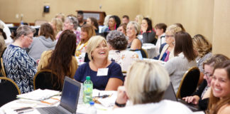 June McCreary, a health sciences instructor at Madison County Area Technology Center’s campus at Estill County High School, laughs with fellow teachers at a New Teacher Institute training session at the Kentucky Association for Career and Technical Education’s summer conference in Louisville. Photo by Mike Marsee, July 24, 2019
