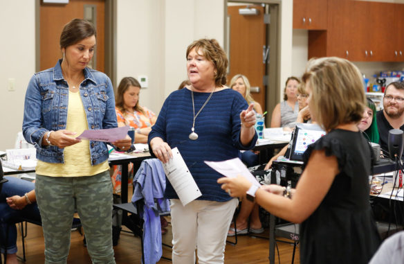 Sherri Clusky, a program consultant in KDE’s Division of Student Success who trains school staff members in the Olweus Bullying Prevention Program, explains an exercise to Montgomery County school staff members during a training session at the Montgomery County Public Library.
