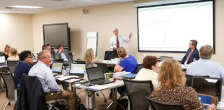 Brian Gong of the Center for Assessment leads a discussion with a panel of educators and other stakeholders whose recommendations were used to define the parameters of Kentucky’s new 5-star accountability system. Photo by Mike Marsee, Sept. 5, 2019