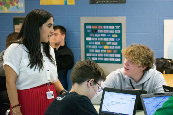 Summer Amro answers questions from a group of students in her class at Woodford County High School.