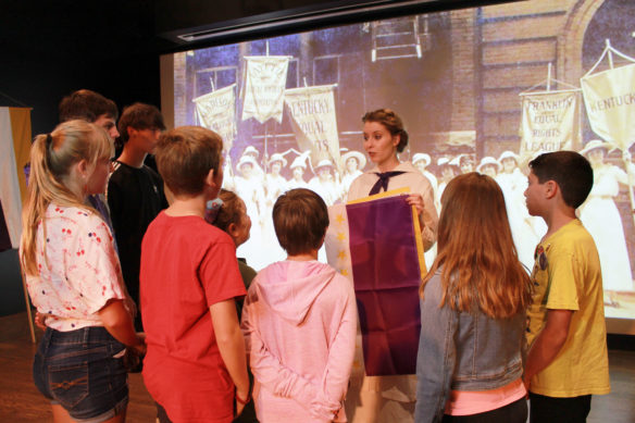 Students discuss the suffrage movement in Kentucky after a live performance at the Frazier History Museum. 