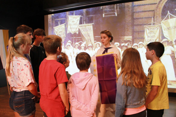Students discuss the suffrage movement in Kentucky after a live performance at the Frazier History Museum.