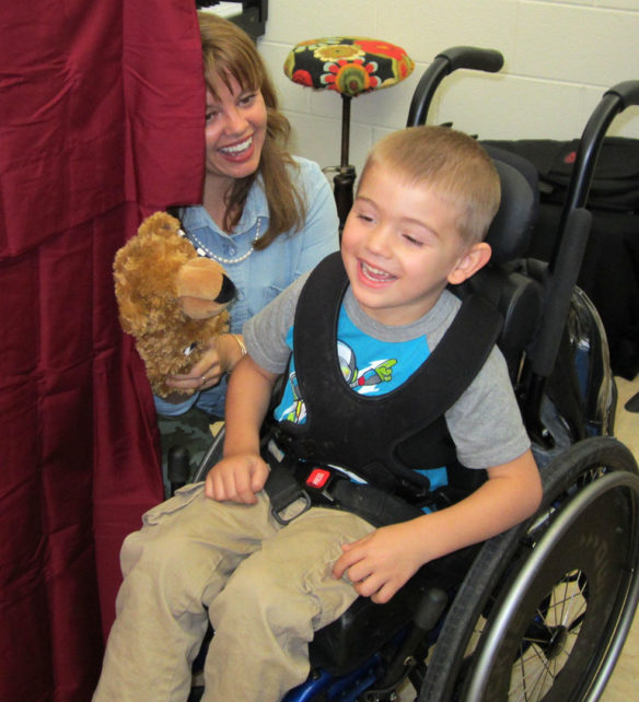 Melanie Callahan uses a puppet theater production of the book "Bear Feels Sick" by Karma Wilson during a creative dramatics class at Laurel County public schools.