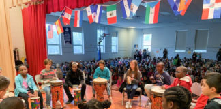 Students in the Bloom Elementary (Jefferson County) mindful drumming group perform for their peers.