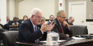 Rep. Bobby McCool (R-Van Lear), left, speaks to the Kentucky General Assembly’s Interim Joint Committee on Education as Sen. Mike Wilson (R-Bowling Green) listens during a meeting at the Capitol Annex in Frankfort. Photo by Mike Marsee, Nov. 20, 2019