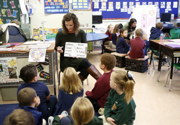 XXXXX, front, and 2nd-grade teacher Jenna Brown, back, work with separate groups of students in station teaching during a class at Brandenburg Primary School (Meade County). Station teaching is one method of co-teaching used in the Meade County schools’ special education model. Photo by Mike Marsee, Nov. 12, 2019