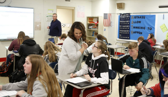 Mathematics teacher Ellen Hall, front, and special education teacher and special education teacher Kevin Robinson, back, work with separate groups of students in parallel teaching during a math class at Meade County High School. Parallel teaching is one method of co-teaching used in the Meade County schools’ special education model. Photo by Mike Marsee, Nov. 12, 2019
