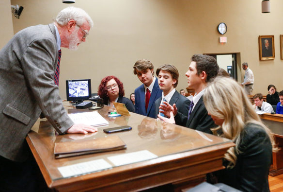 Jessamine Career and Technology Center (Jessamine County) students get instructions from Pat Molloy, a retired state and federal prosecutor serving as the presiding judge for their mock trial practice at the Jessamine County Courthouse. Photo by Mike Marsee, Dec. 9, 2019
