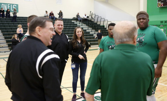 Cheyenne Jennings, center, interprets as Kentucky School for the Deaf boys basketball coach Mike Yance talks with officials, players and coaches during the captains’ meeting prior to KSD’s game against South Carolina School for the Deaf and Blind in the in the Mason-Dixon Tournament at KSD. Photo by Mike Marsee, Jan. 23, 2020