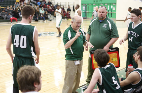 Kentucky School for the Deaf boys basketball coach Mike Yance talks to his players during a timeout in their game against South Carolina School for the Deaf and Blind at the Mason-Dixon Tournament. Photo by Mike Marsee, Jan. 23, 2020