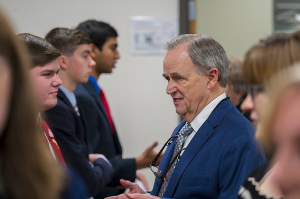 Lee Todd, a member of the Kentucky Board of Education, talks with representatives of career and technical student organizations who were recognized at a KBE meeting in Frankfort. Photo by Marvin Young, Feb. 4, 2020