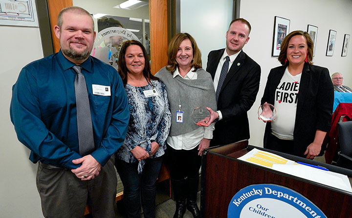 Doug Brewer, from left, and Jennifer Sanders, staff members at the Kentucky School for the Deaf, were recognized with the Making a Difference award at the Feb. 4 Kentucky Board of Education meeting for quick actions that helped save the life of a student.
