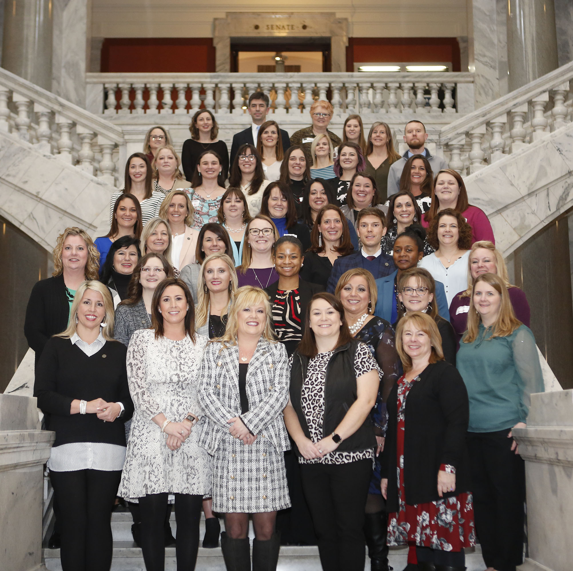 Some of the 219 Kentucky educators who make up the most recent class of National Board Certified Teachers pose for a photo at the Kentucky State Capitol. Photo by Mike Marsee, Feb. 11, 2020