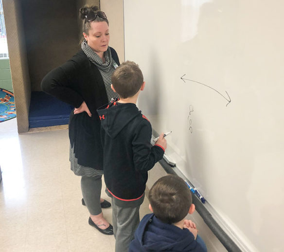 Allison Slone talks with two of her students at McBrayer Elementary School (Rowan County). Submitted photo by Mandy Triplet, Feb. 12, 2020