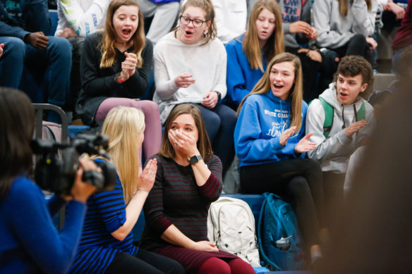 Laura Cole, a mathematics teacher at Scott High School (Kenton County), reacts with surprise as it was announced that she is the latest Kentucky educator to receive a Milken Educator Award from the Milken Family Foundation.