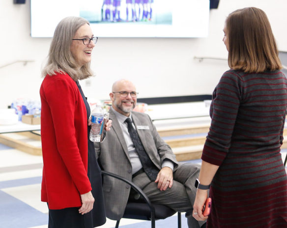 Kentucky Board of Education member JoAnn Adams, left, talks with 2019 Milken Educator Award winner Laura Cole, right, and Principal Brennon Sapp during a visit to Scott High School (Kenton County). Photo by Mike Marsee, Feb. 26, 2020