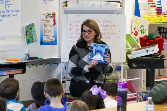 Kentucky Board of Education member Cody Pauley Johnson reads to a class at Peaks Mill Elementary (Franklin County).