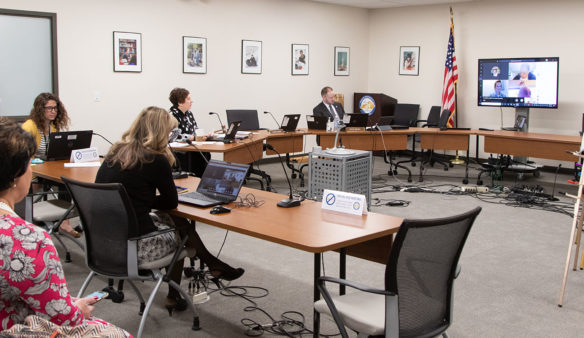 Members of the Kentucky Board of Education discuss the results of a community survey during a virtual meeting in Frankfort that included Interim Education Commissioner Kevin C. Brown, right, and vice chairwoman Lu Young, second from right. Photo by Danielle Harris, March 18, 2020