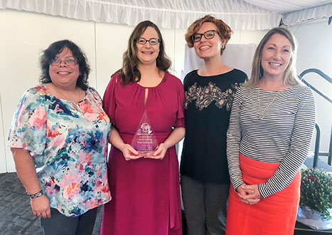 Catherine del Valle, Spanish teacher at Russell High School (Russell Independent), Elena Kamenetzky, Japanese teacher at Eastern High School (Jefferson County), Brenna Byrd, German professor at the University of Kentucky and Fayette County Public Schools World Language Coordinator Laura Roche pose for a photo at Kamenetzky's regional award ceremony.