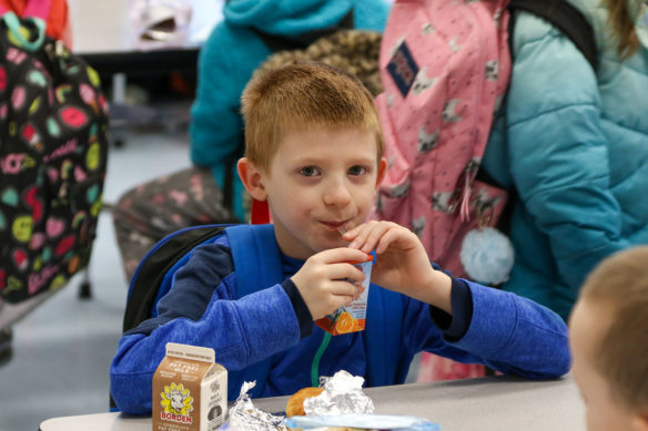 A student at Peaks Mill Elementary School (Franklin County) eats lunch in early March.