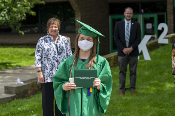 Kentucky School for the Deaf graduate Layne Adkins poses for picture with her diploma.