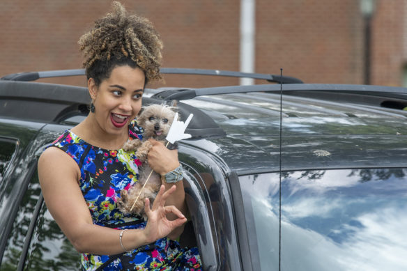 Kentucky School for the Deaf Science teacher Brittany Voll watches from her car as her students graduate.