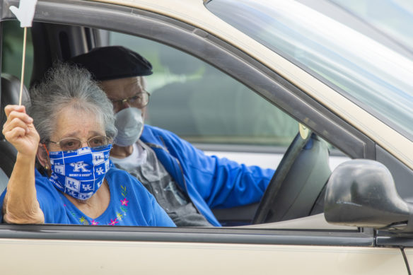 Carolyn Gulley, an alumnus of the Kentucky School for the Deaf, celebrates the school's class of 2020 from her vehicle.