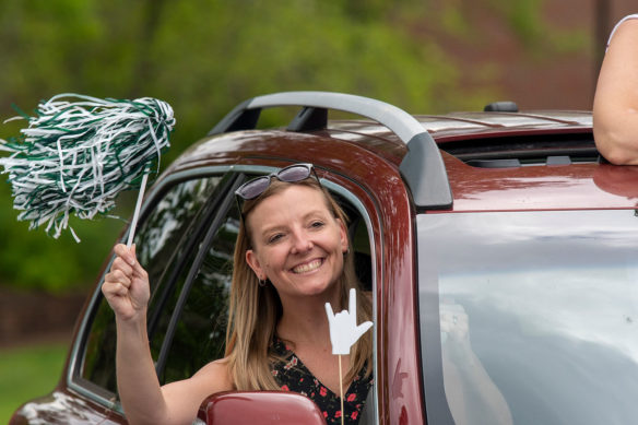 Laura Sparrow, an elementary teacher at the Kentucky School for the Deaf, cheers on KSD's class of 2020.