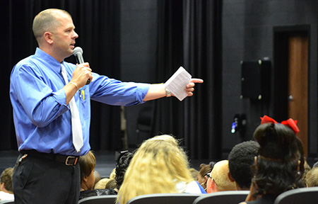 Chris Bentzel, Christian County's new Superintendent, speaks with students at an event before the COVID-19 pandemic.