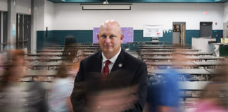 Ben Wilcox, Kentucky’s first state school security marshal, stands in Farristown Middle School in Madison County in August. 2019.