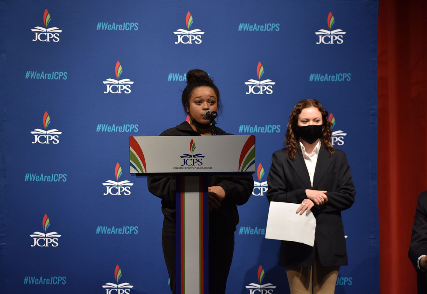 Fairdale High School student Kali Berry and Pleasure Ridge Park High School student Madi Searcy spoke after the announcement of the Everyone Counts initiative. 